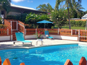 Bungalow charmant à Sainte-Rose, piscine partagée